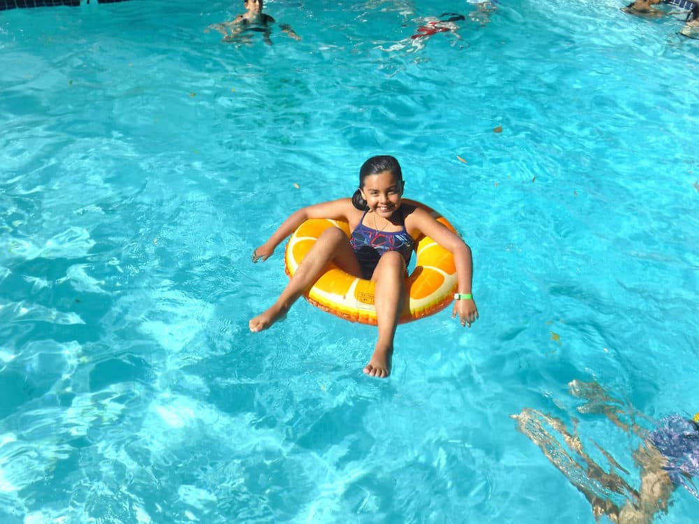 Girl in pool in tube