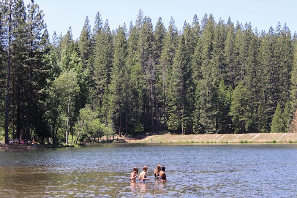 Group of campers in a lake